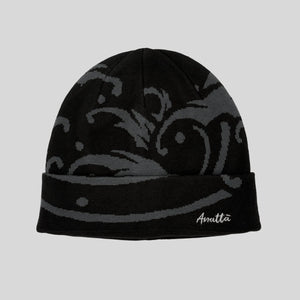 Black and gray beanie with wave pattern on a light gray background - Anatta Streetwear