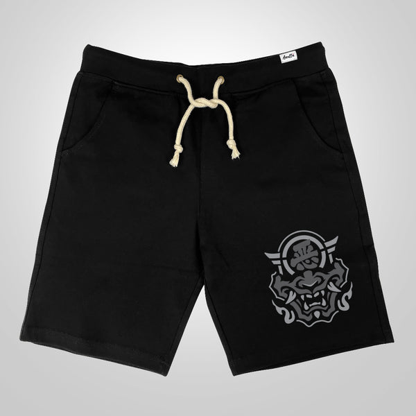 Hannya Mask - A Japanese style black shorts featuring a graphic design of the Japanese Hannya mask,  printed on the left.