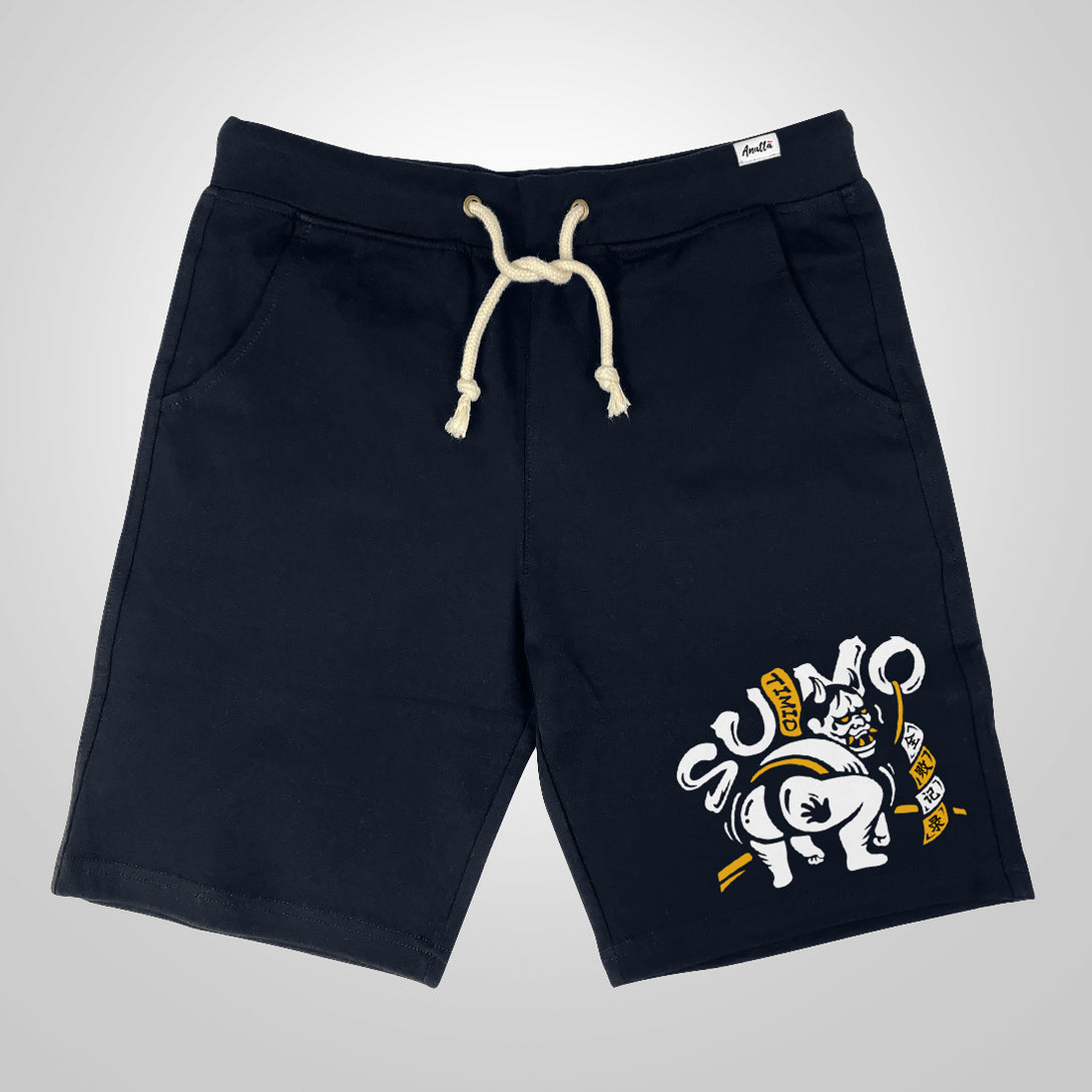 Timid Sumo - A Japanese style dark blue shorts featuring a cute design of a timid sumo printed on the right.