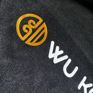 a close up of the special edition wukong tee - vintage wash - gold ink print - anatta streetwear -2