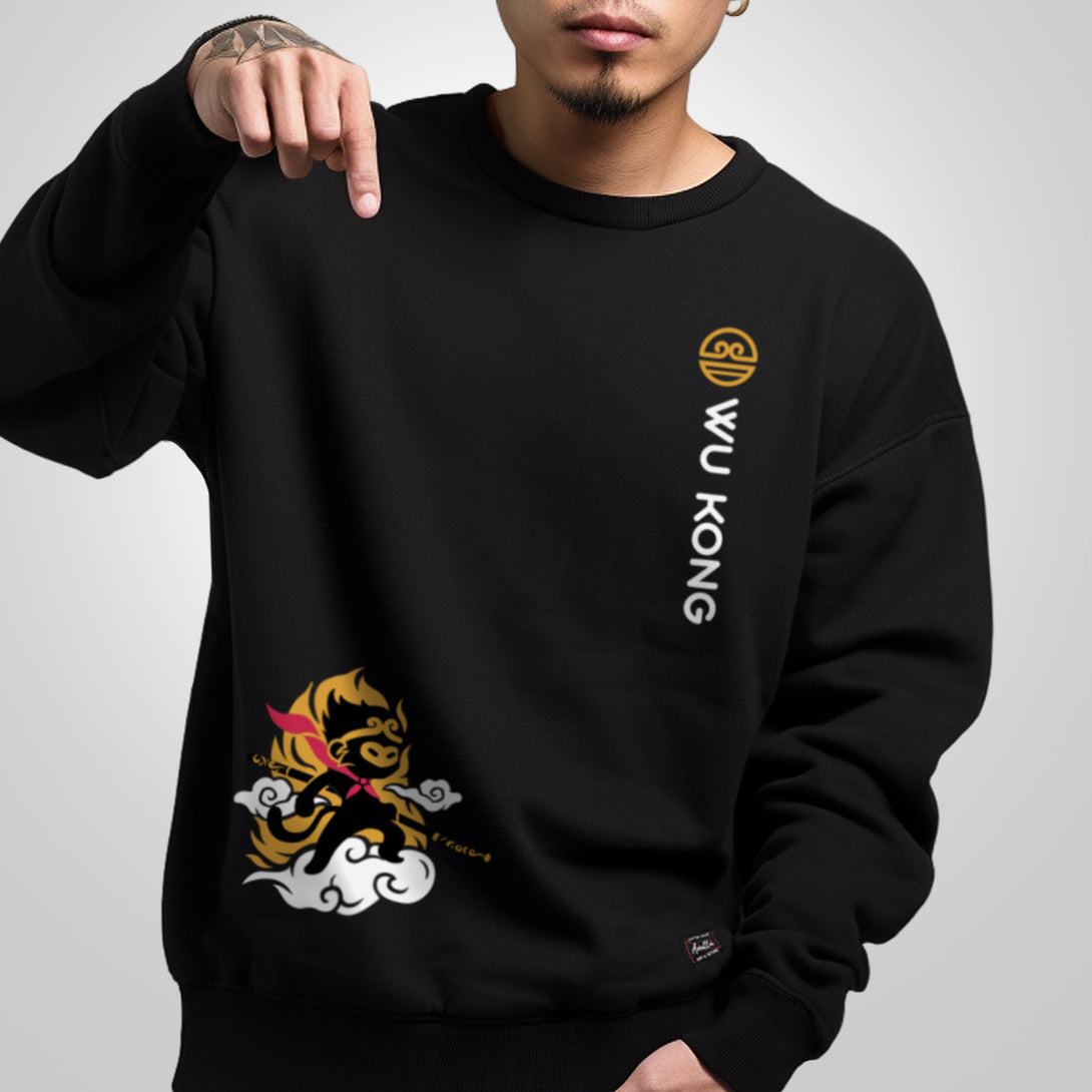 Wukong - a model wearing a black sweatshirt featuring a design of a minimalist style Wukong printed in the bottom right corner. The word Wukong and an icon are printed on the left front