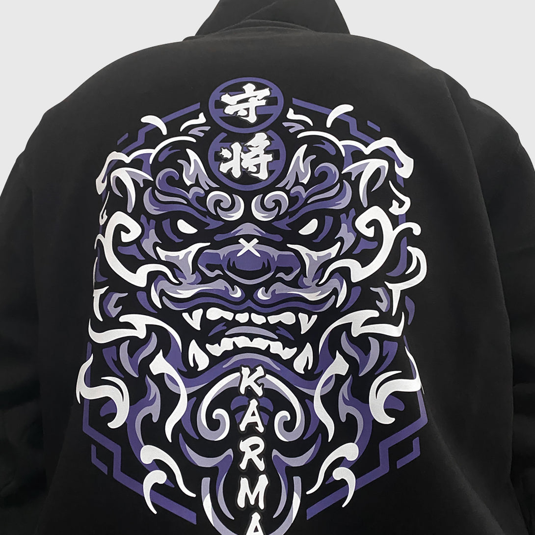 Wrathful deity - a model wearing a black hoodie with a Japanese mythical creature illustration on the back-back view-1