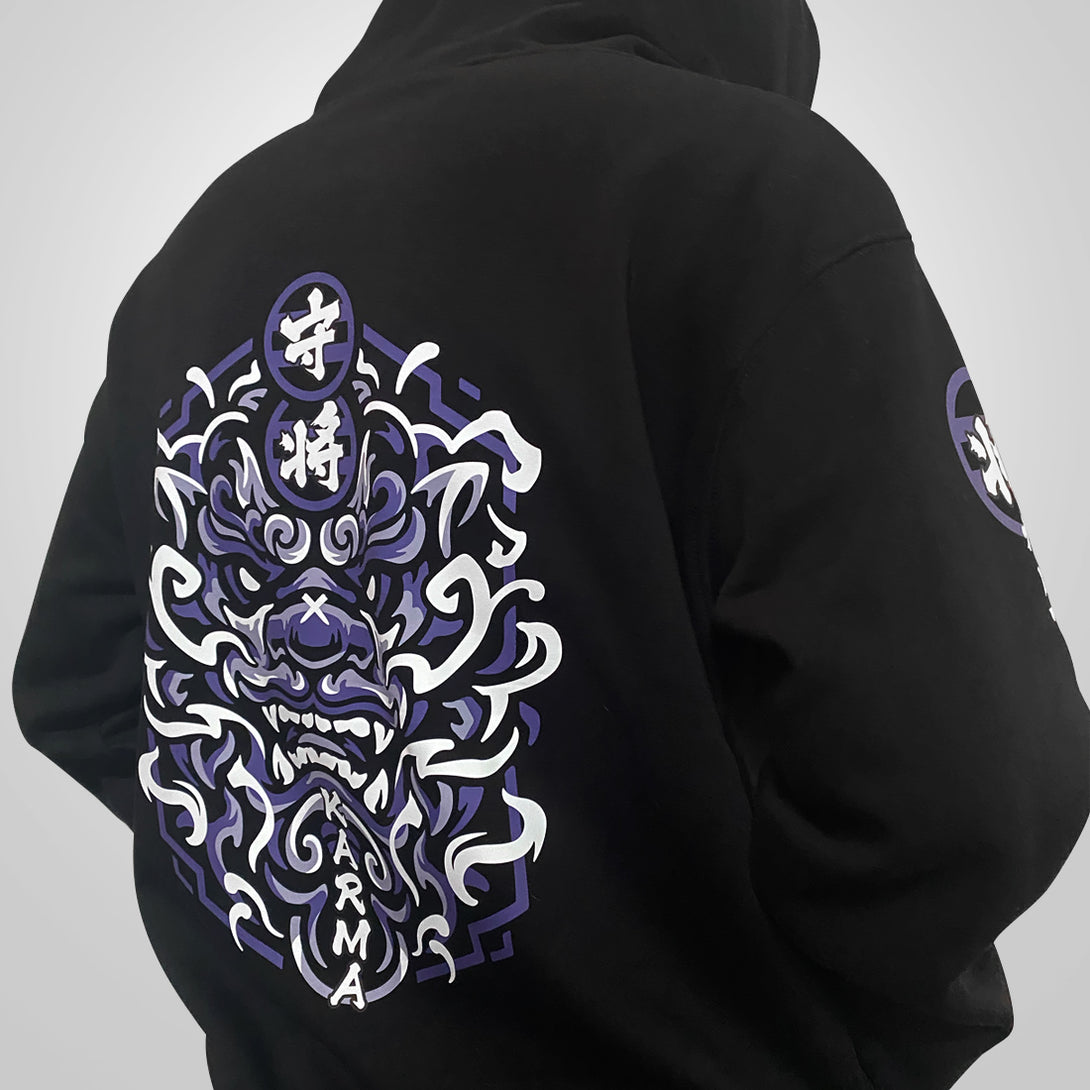 Wrathful deity - a model wearing a black hoodie with a Japanese mythical creature illustration on the back-back view-2