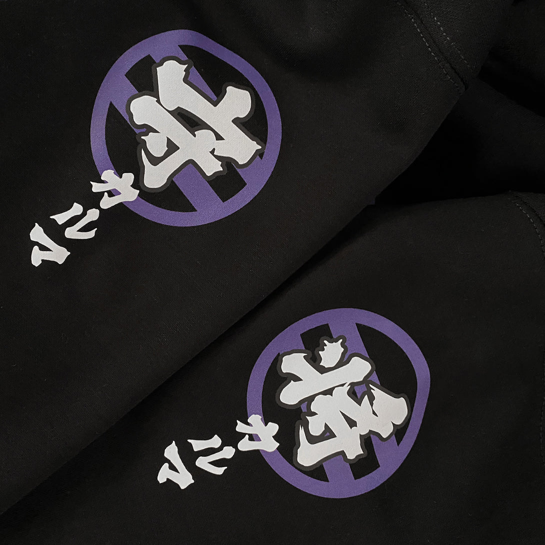 Wrathful deity - a close-up of the graphic design on a Japanese style black hoodie sleeves