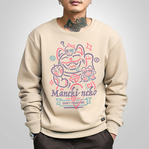 Not to believe in luck - a model wearing a khaki sweatshirt, featuring a Japanese luck cat design printed on the front