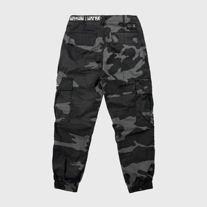 Back view of Camouflage cargo pants on a light gray background- Anatta Streetwear
