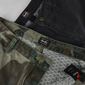 Detail views of camo and black cargo pants - Anatta Streetwear