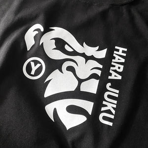 a close-up of a graphic design of the angry ape, printed on the front of a black heavyweight T-shirt - Anatta Streetwear