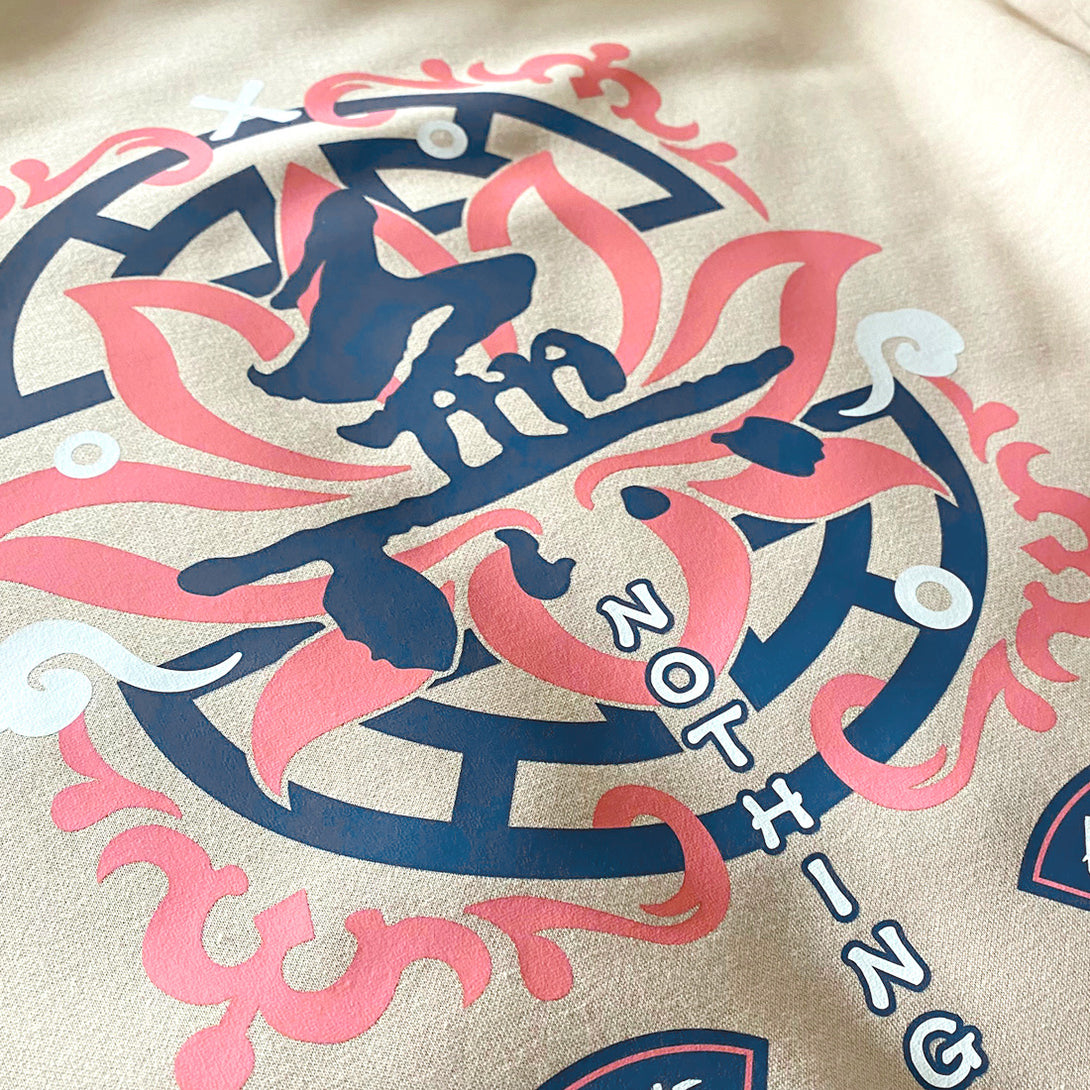Emptiness - a close-up of the design with a background of religious patterns, overlaid with the Chinese character WU (meaning emptiness) , printed on the back of the khaki sweatshirt.
