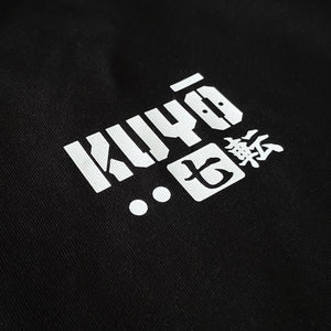 Daruma kuyō - a close-up of a text graphic design, printed on the left chest of a Japanese style black heavyweight T-shirt