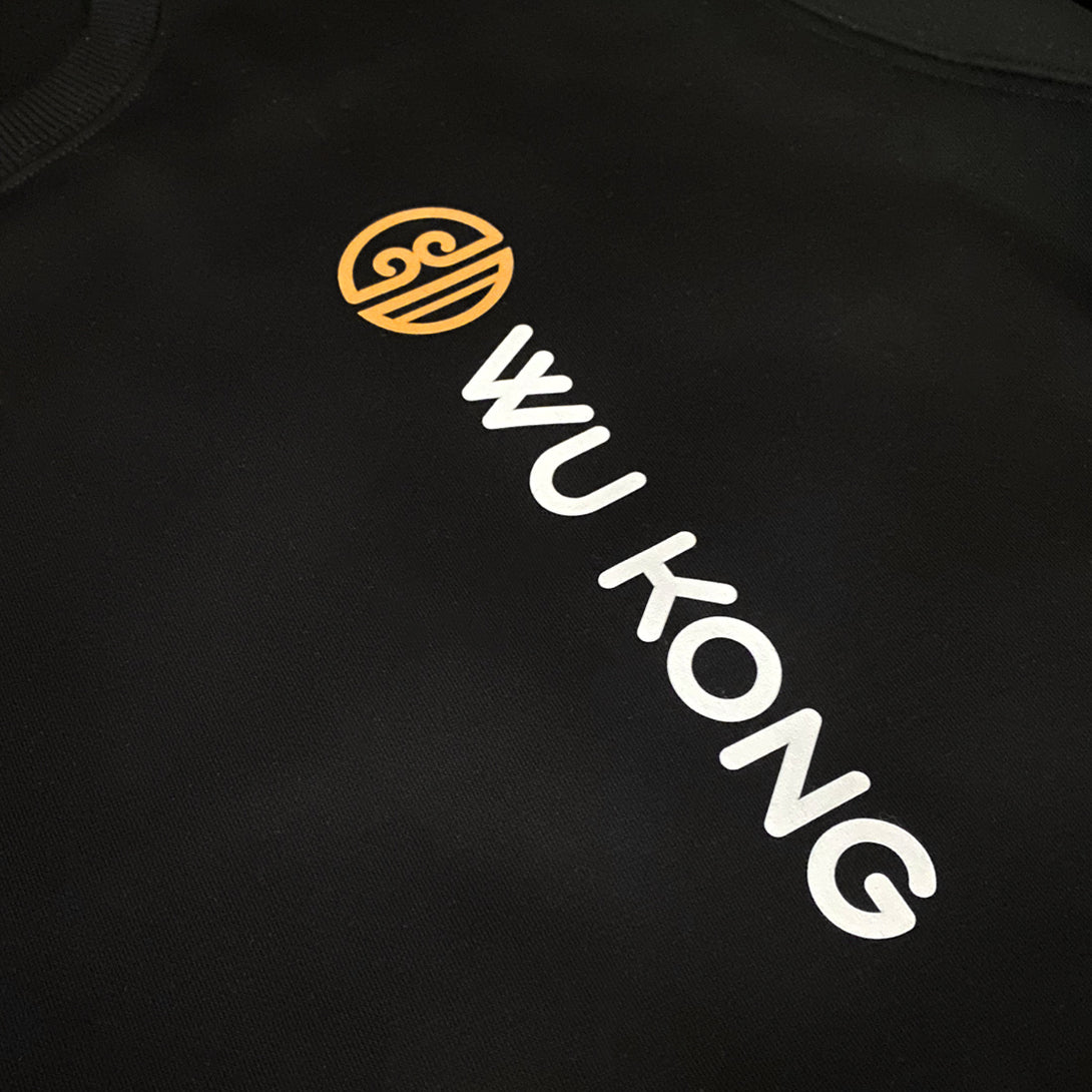 Wukong - a close-up of the word Wukong and an accompanying icon, printed on the left front of the black sweatshirt.