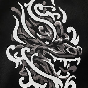 Buddhism Dragon Guardian - a close-up of a design of a Buddhism Dragon Guardian printed on the left of a Japanese style black sweatpants