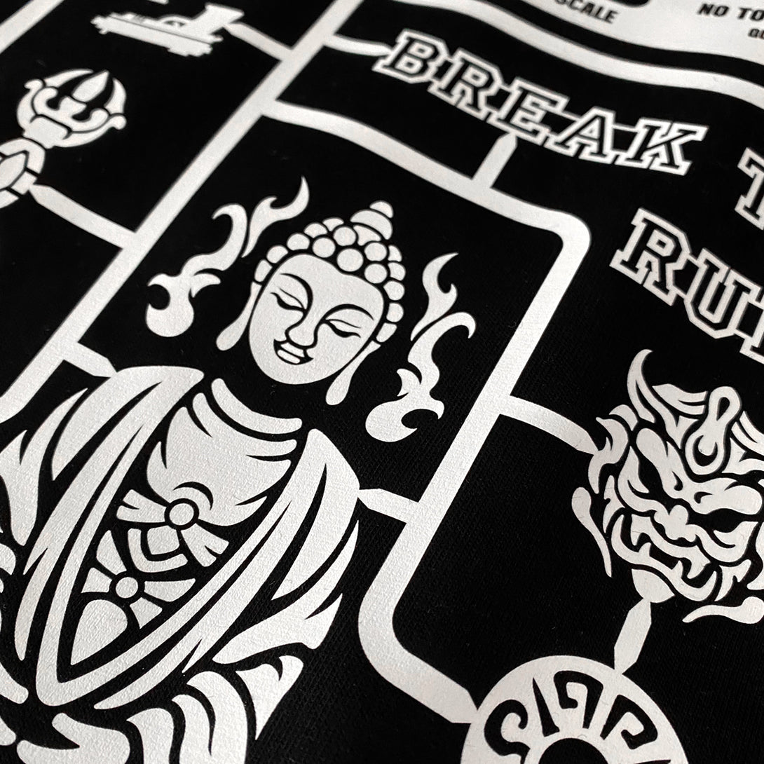 Buddha model kit - a close-up of a vintage-style Buddha model kit design printed on the front of a Japanese style black heavyweight T-shirt -2
