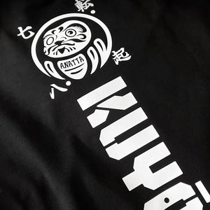 Daruma kuyō - a close-up of a design of daruma doll, printed on the back of a Japanese style black heavyweight T-shirt