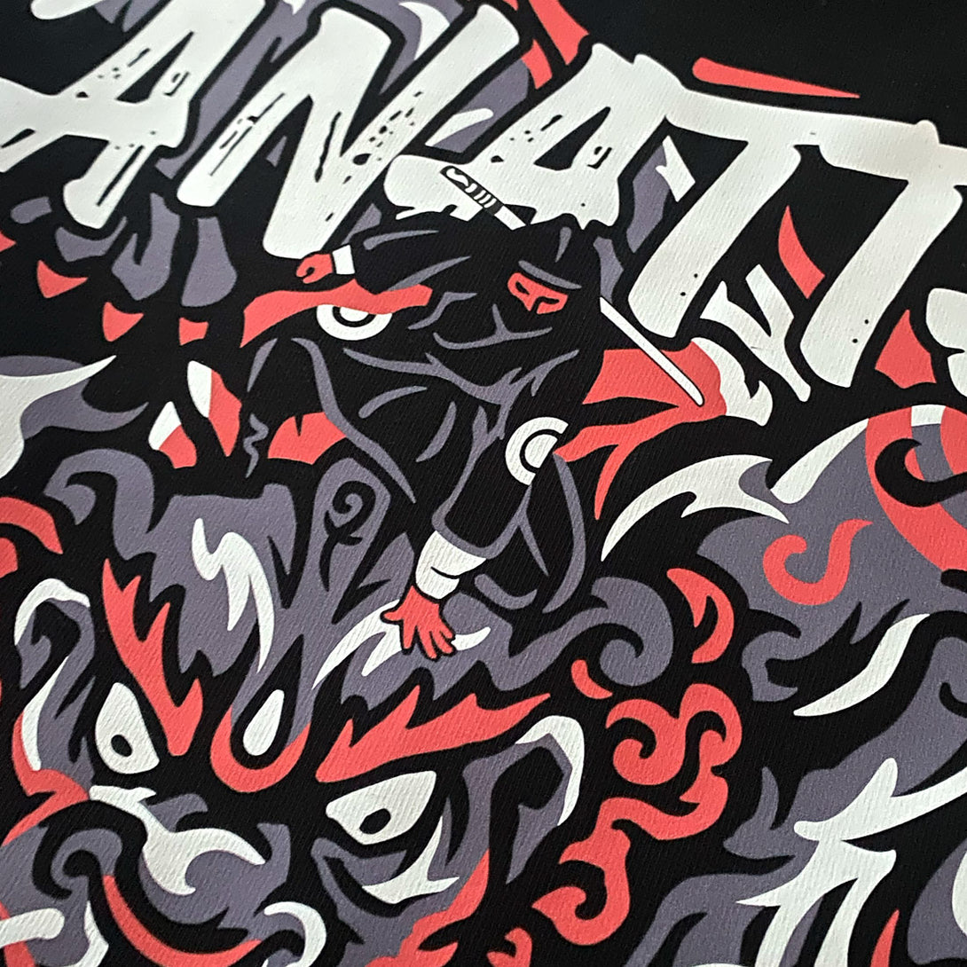 a close-up of a design showcasing a ninja controlling a mythical beast, printed on the front of a black sweatshirt-1, anatta streetwear