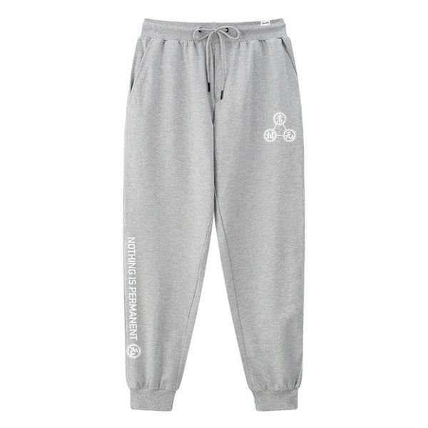 Mudra - A Japanese style light grey sweatpants featuring a design of religious mantras, printed on the left. English letters are printed on the lower right leg.