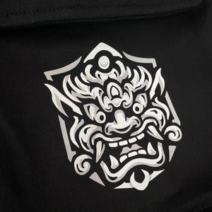 Onigawara - a Japanese style black flap pocket pants with original design printed on the two pockets- back view