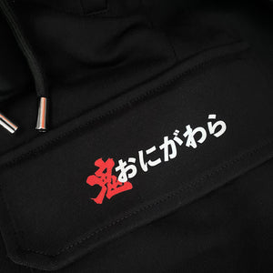 Onigawara - a close-up of the original design printed on the Japanese style black flap pocket pants-2