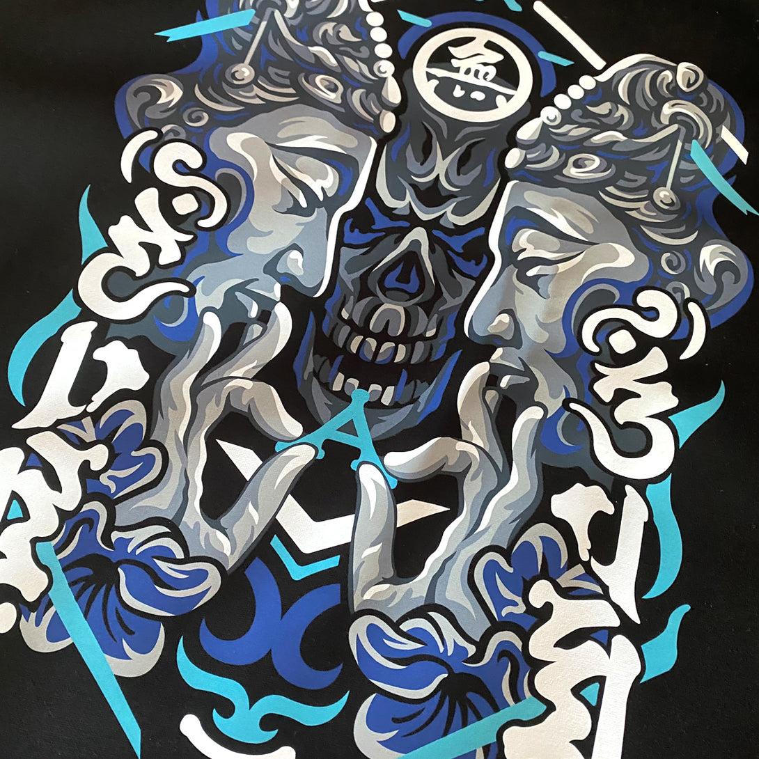 Umarekawari - a close-up of a design of Buddhas confronting the evil illustration printed on the back of a Japanese style black hoodie-2