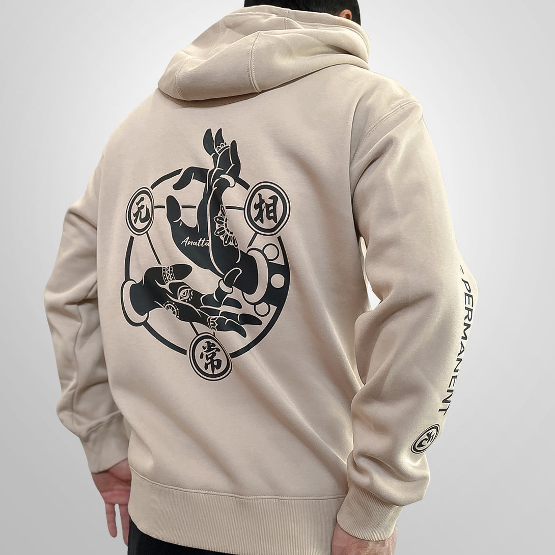 Mudra - a model wearing a khaki hoodie with the graphic design of t Buddhism Mudra printed on the back-back view-1
