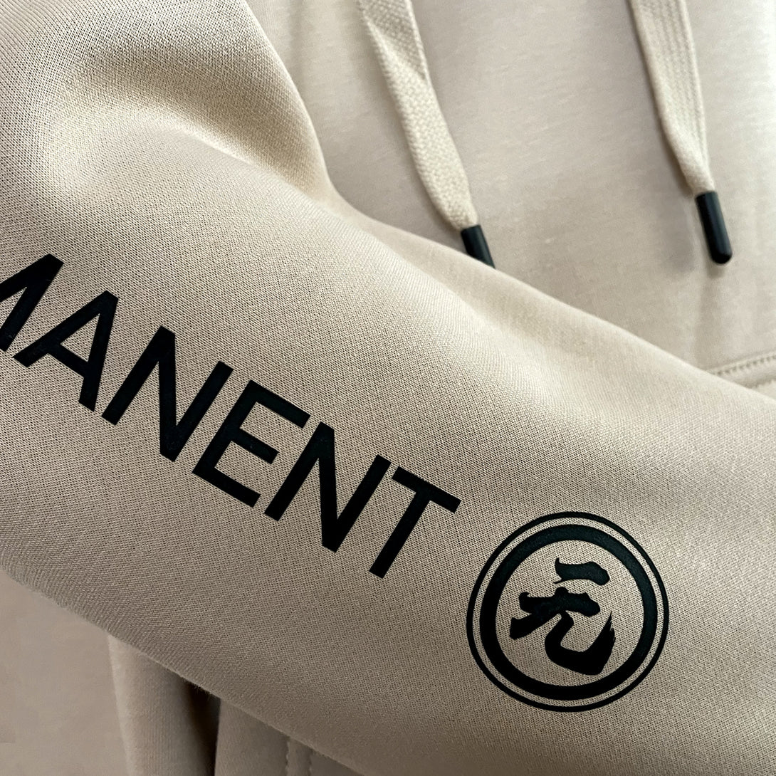 Mudra - a close-up of the graphic design on a Japanese style Khaki hoodie sleeves