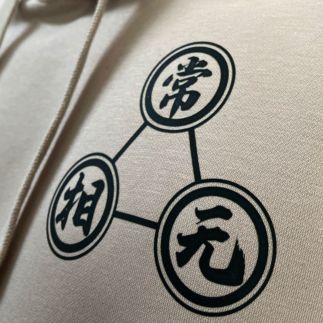 Mudra - a close-up of the graphic design printed on the front of the Japanese style khaki hoodie-1