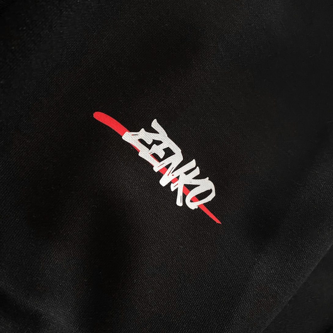 Zenko - a close-up of the graphic design on a Japanese style black hoodie sleeves