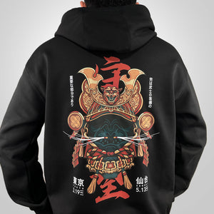 Kabuto - a model wearing a black hoodie with the intricate illustration of a Japanese samurai helmet printed on the back-back view-2