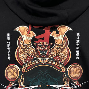 Kabuto - a close-up of the intricate illustration of a Japanese samurai helmet printed on the back of a Japanese style black hoodie.