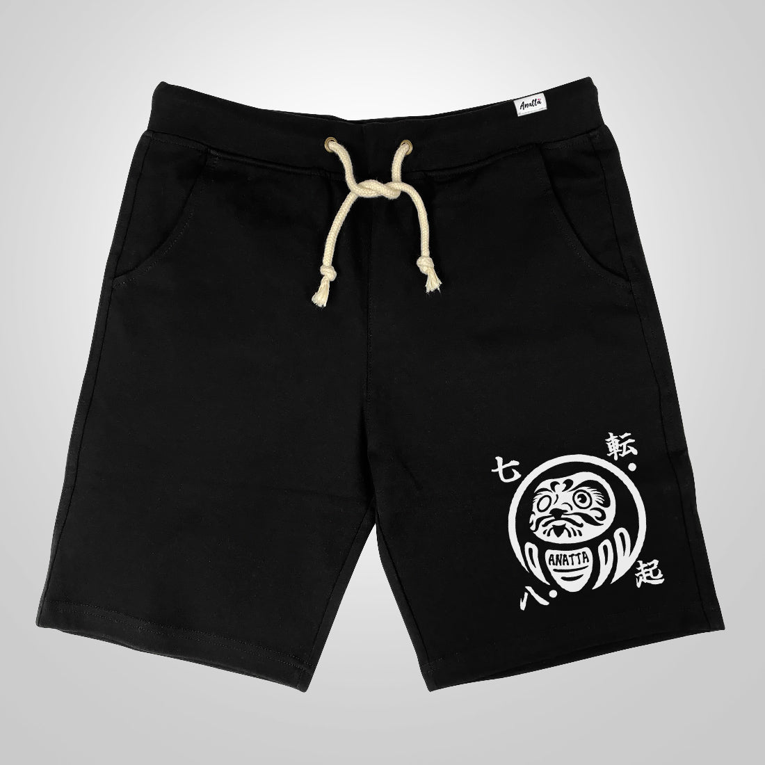 Daruma kuyō - A Japanese style black shorts featuring a design of a Japanese daruma doll,  printed on the left.