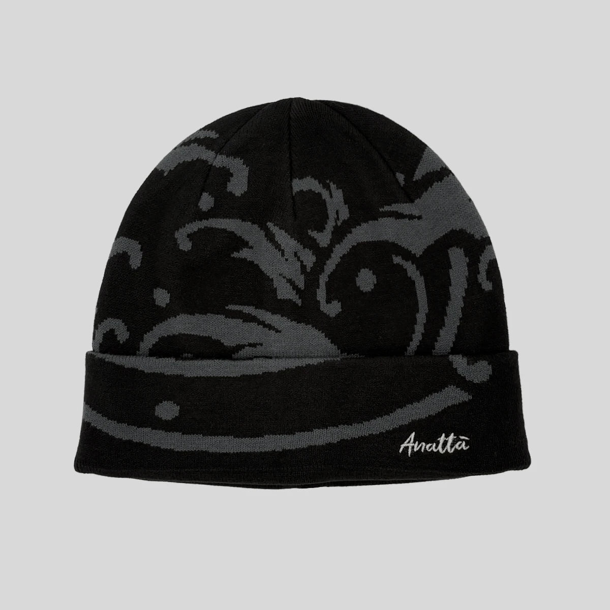 Black and gray beanie with wave pattern on a light gray background - Anatta Streetwear