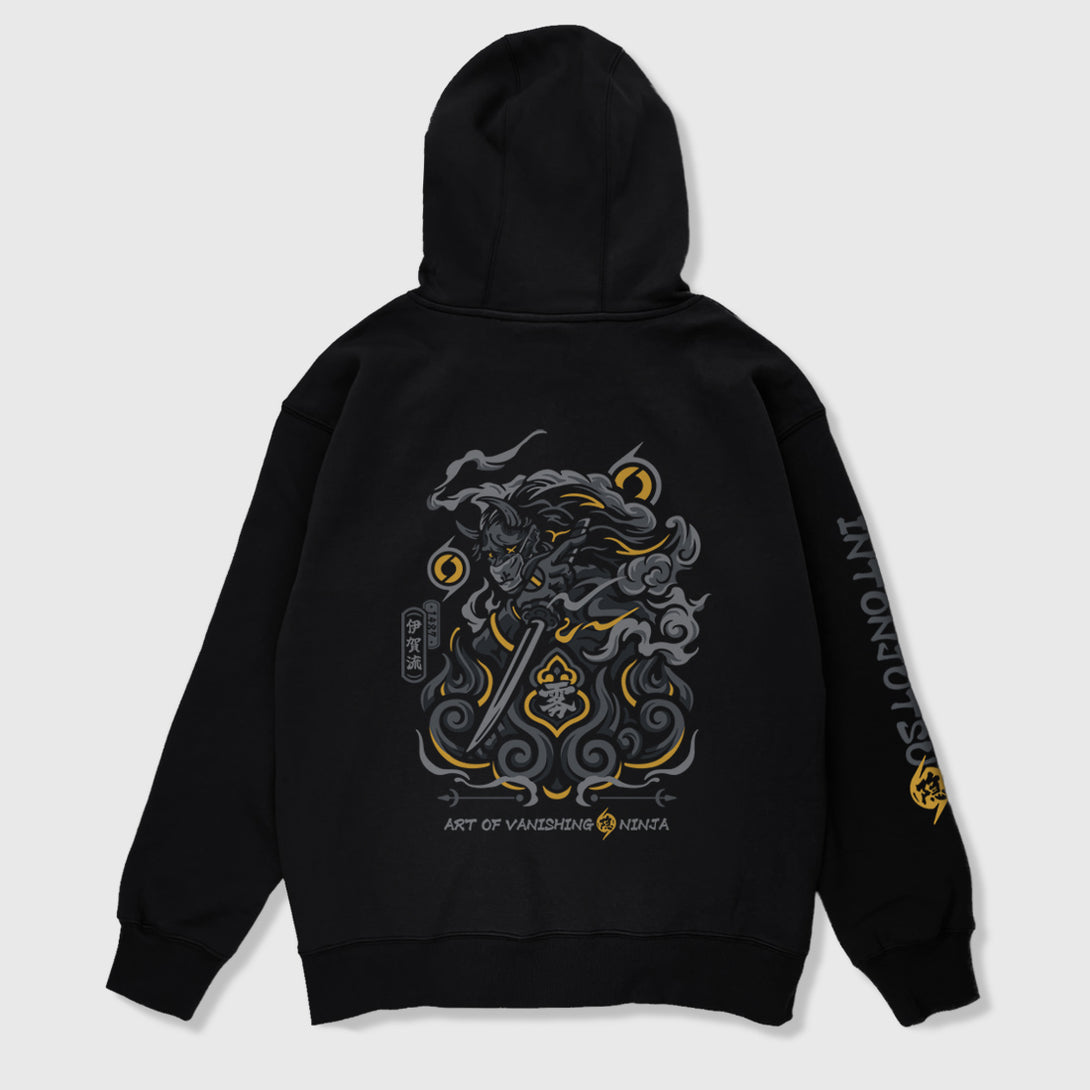 A Japanese-style black hoodie featuring a graphic design inspired by Intonjutsu (art of vanishing), printed on the back—Anatta Streetwear. Perfect for fans of ninja lore, stealth techniques, and street fashion.