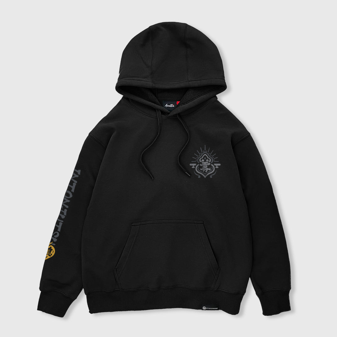 Front view of the Japanese-style black hoodie featuring a small graphic design printed on the left chest - Anatta Streetwear. Ideal for street fashion enthusiasts