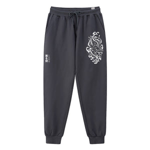 Buddhism Dragon Guardian - A Japanese style dark grey sweatpants featuring a design of a Buddhism Dragon Guardian, printed on the left. Japanese characters are printed on the right.