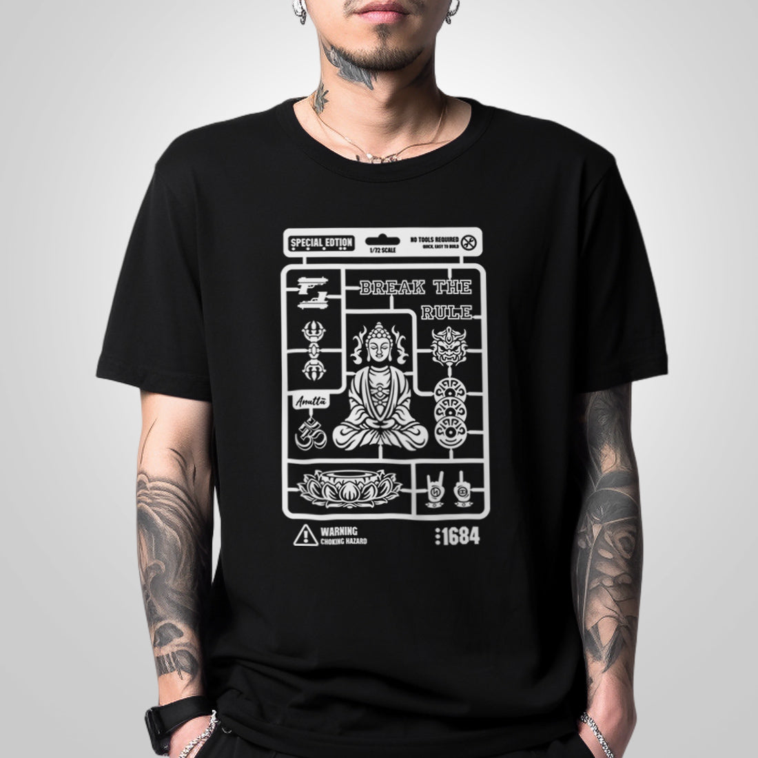 Buddha model kit - a model wearing a Japanese style black heavyweight T-shirt, featuring a vintage-style Buddha model kit design printed on the front.