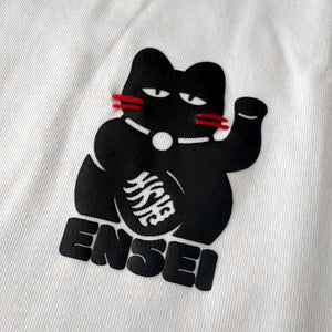 Close-up of Japanese-inspired lucky cat graphic on chest – Anatta