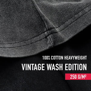 Close-up of a vintage black fabric with '100% Cotton Heavyweight Vintage Wash Edition' text and weight information.