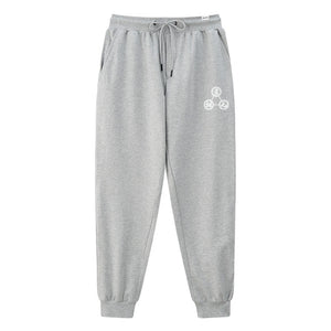 Mudra - A Japanese style light grey sweatpants featuring a design of religious mantras, printed on the left.