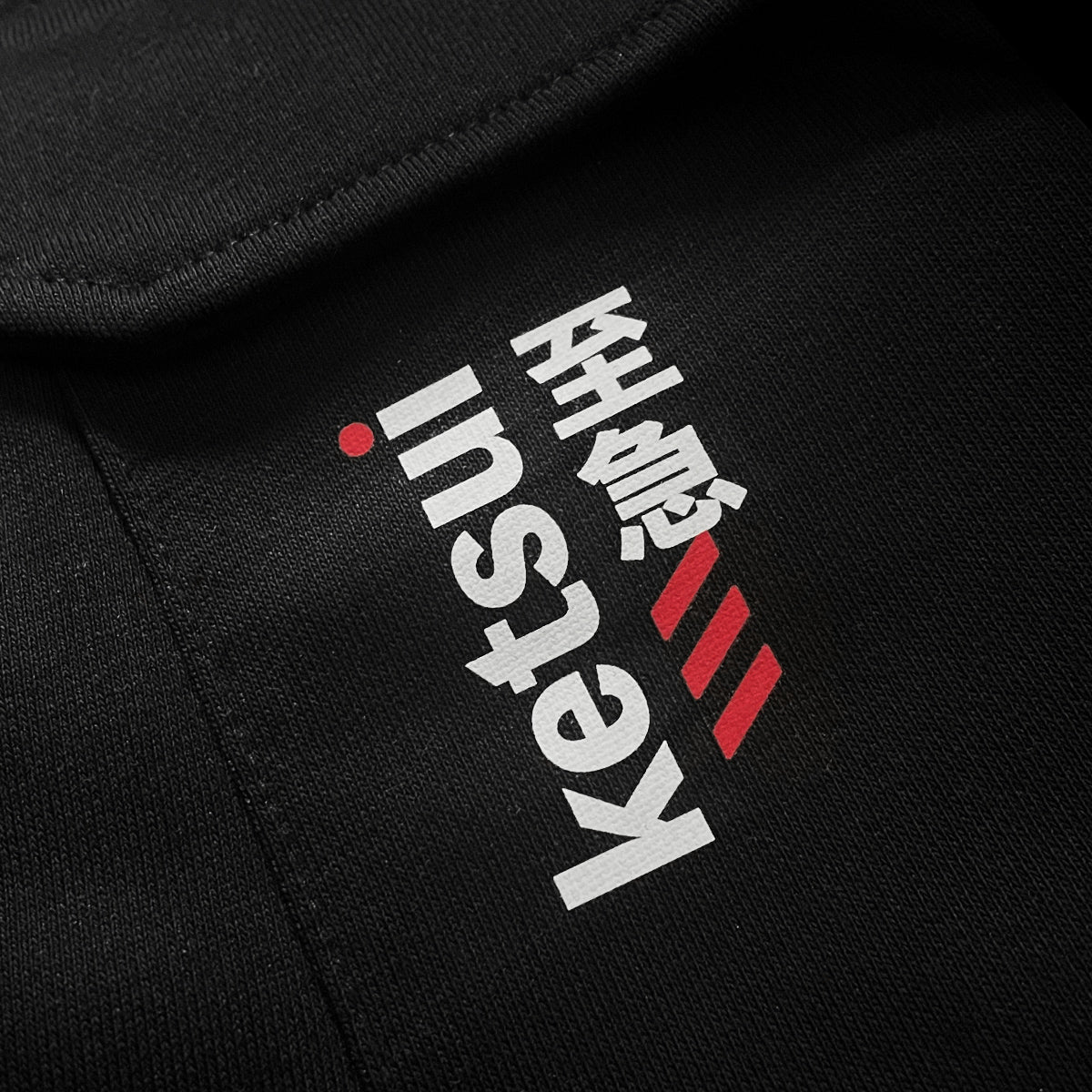 Kitsune Warrior - a close-up of the original design printed on the Japanese style black flap pocket pants-3