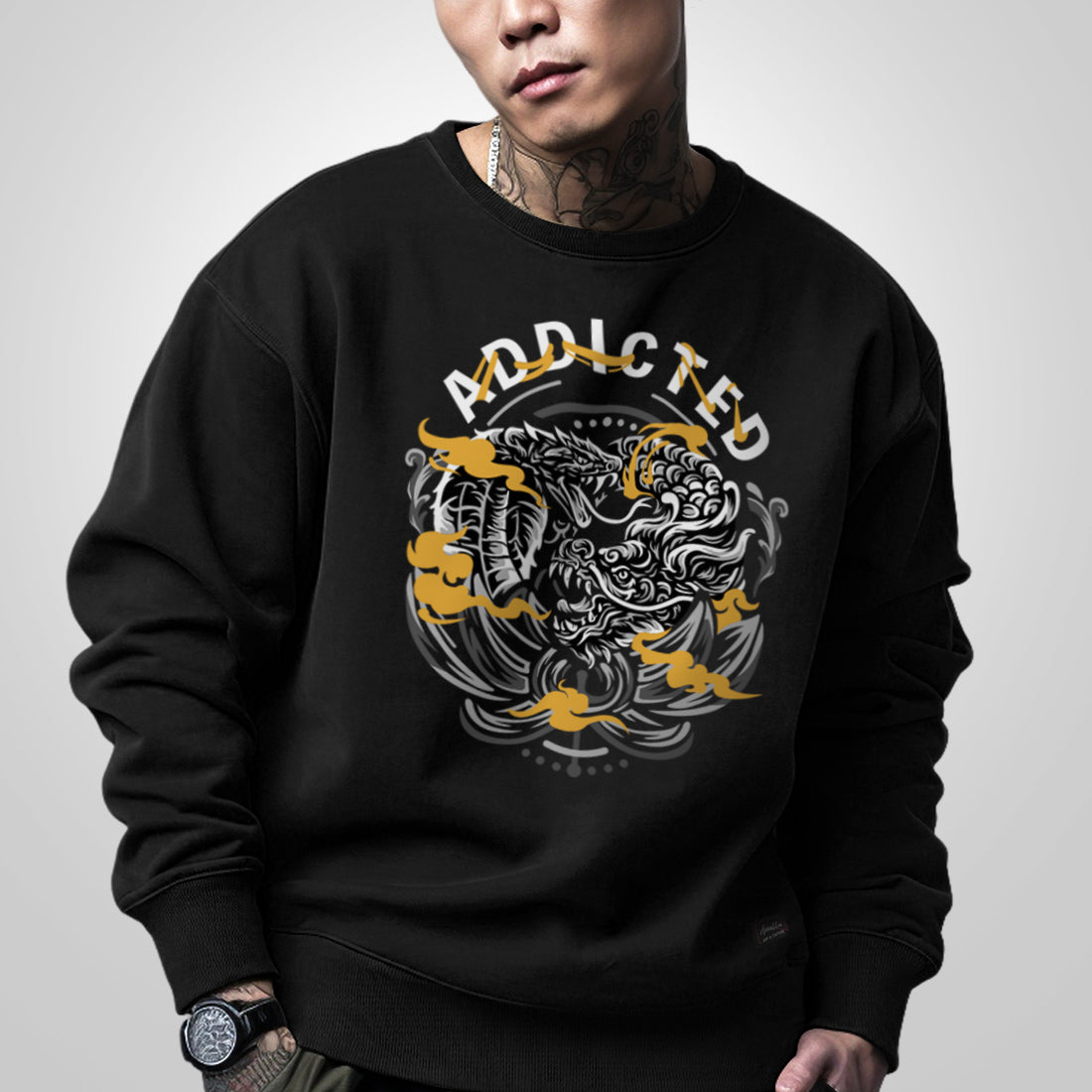 Addiction - a model wearing a black sweatshirt, featuring a design of a dragon and a snake in combat, printed on the front