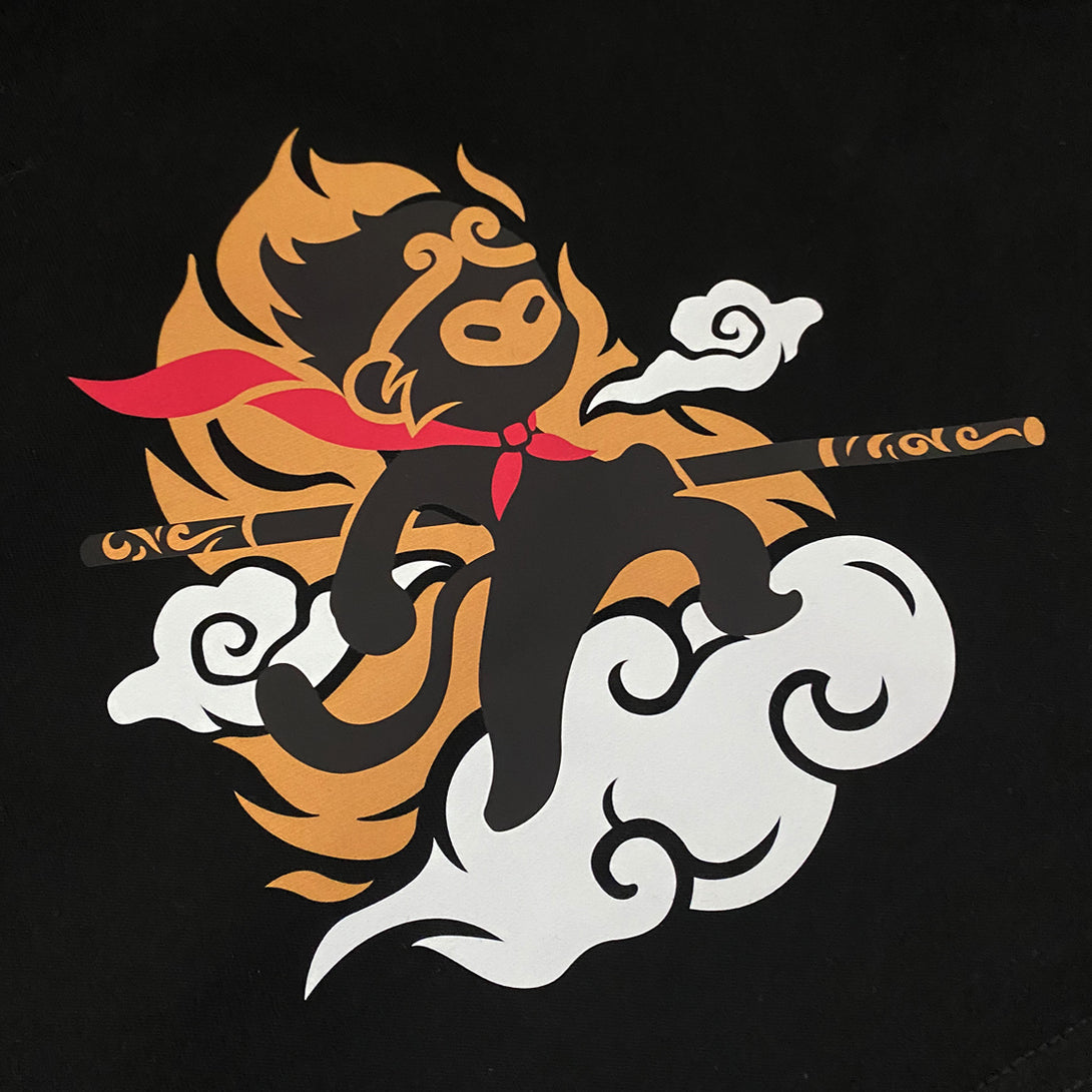 Wukong - a close-up of a design of a minimalist style Wukong printed on a Japanese style black heavyweight T-shirt-1