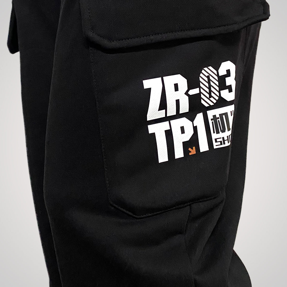 Mecha-Danger Zone - a Japanese style black flap pocket pants with original graphic design - left side view