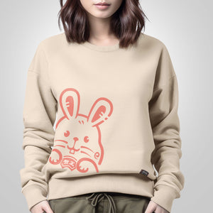 The Year of Rabbit - a model wearing a khaki sweatshirt, featuring a cute rabbit design printed on the front
