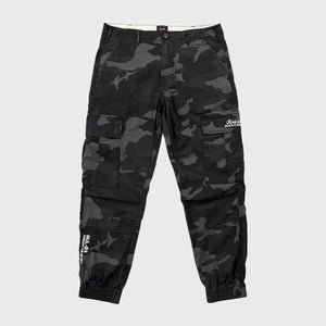 Black camouflage cargo pants on a light gray background - Anatta Streetwear