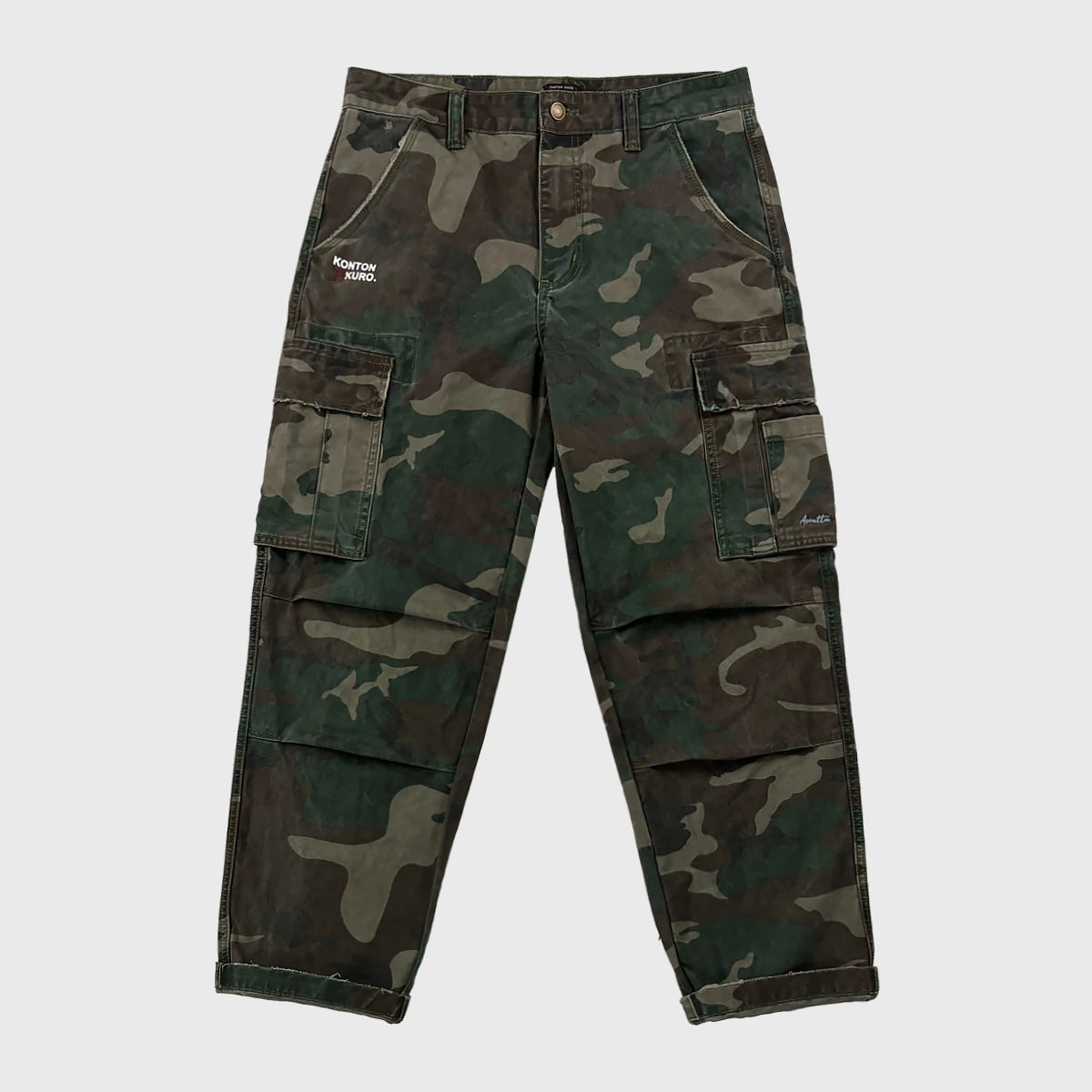 Camouflage cargo pants on a light gray background - Anatta Streetwear