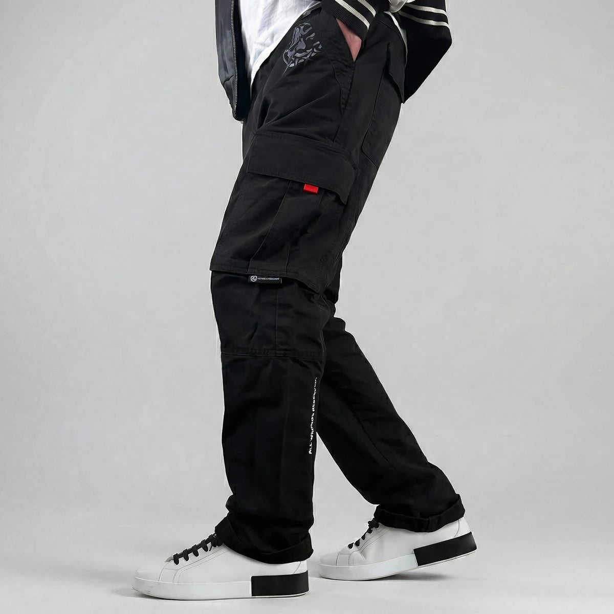 model wearing anatta's black cargo pants - Anatta Streetwear