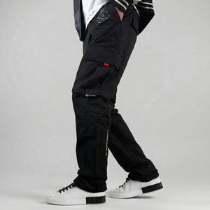 model wearing anatta's black cargo pants - Anatta Streetwear