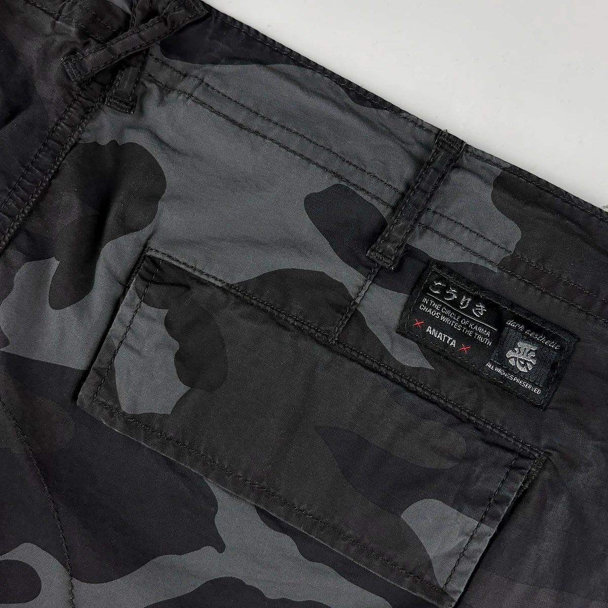 Camouflage pants with a brand label  - Anatta Streetwear