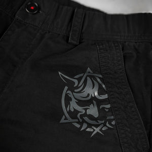 Black cargo pants with metallic Hannya mask design on the pocket – Anatta Streetwear