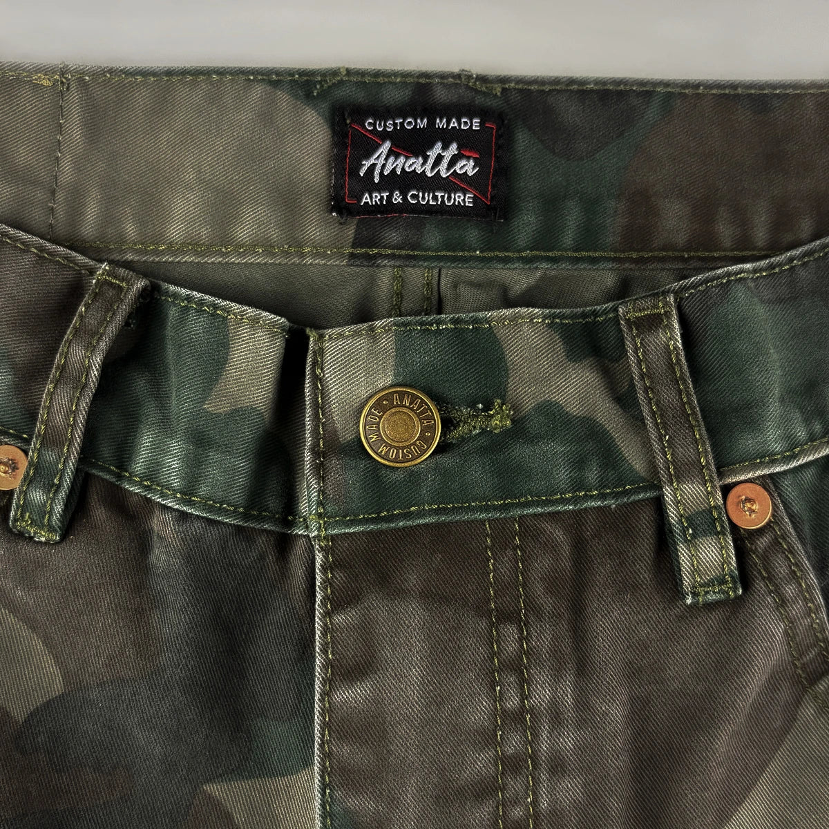 Camo shorts with Anatta label on the waistband